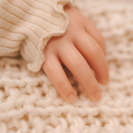 Bébé reborn réaliste : les 7 critères qui ne trompent pas